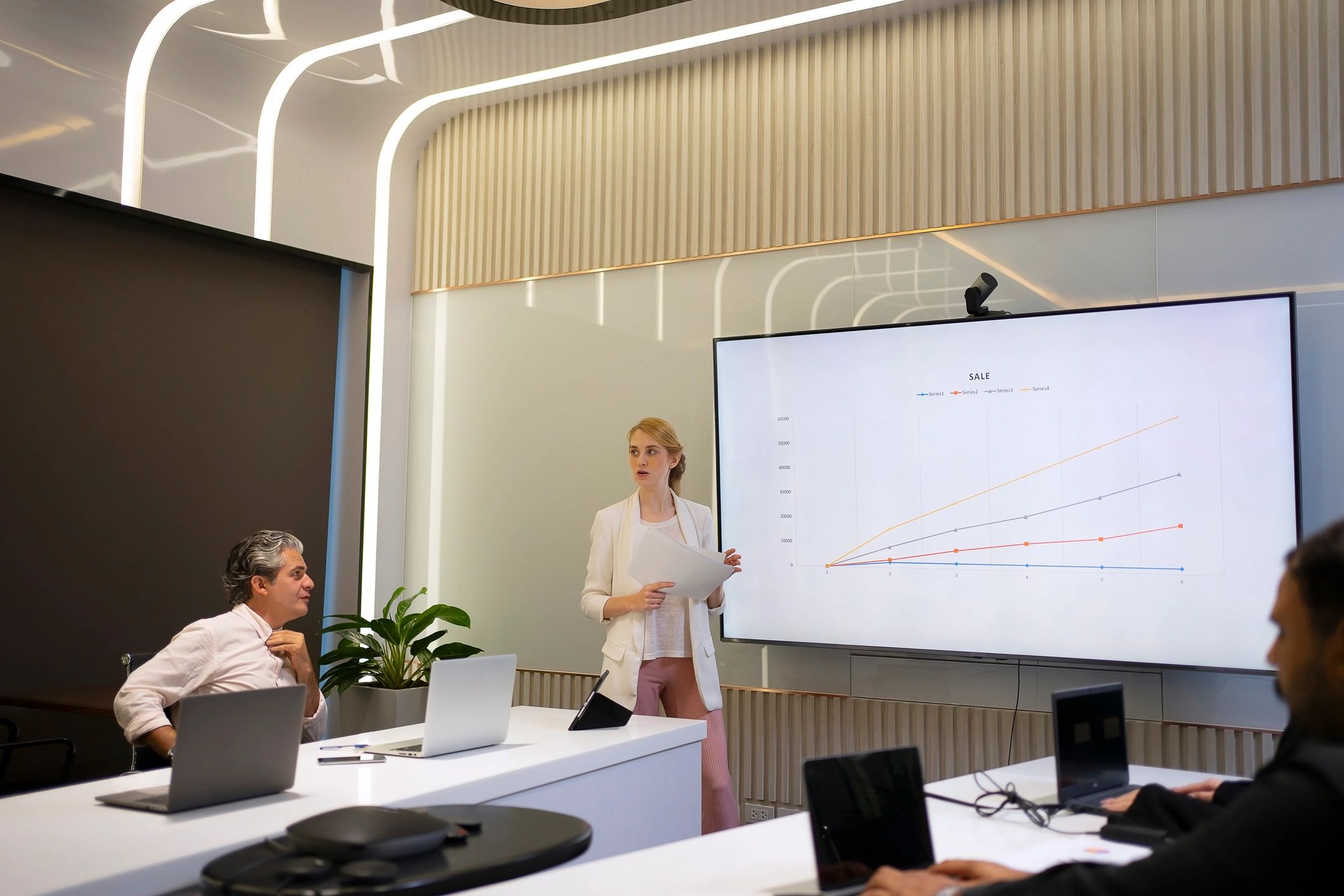 Strategy workshop with professionals collaborating in a meeting room